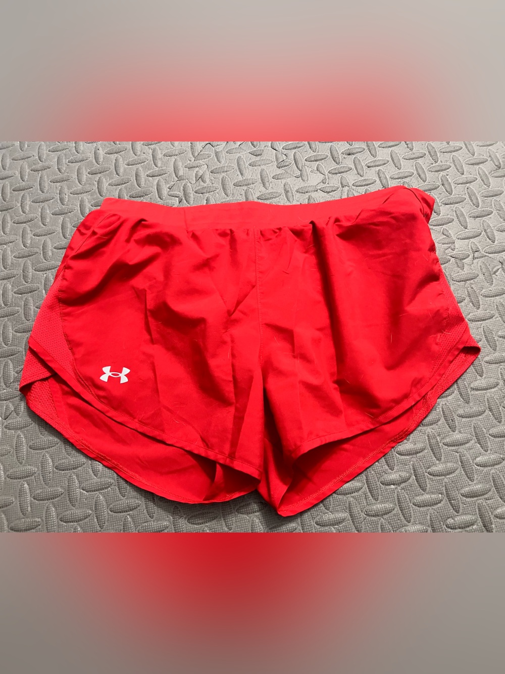 Red under Armour shorts, medium